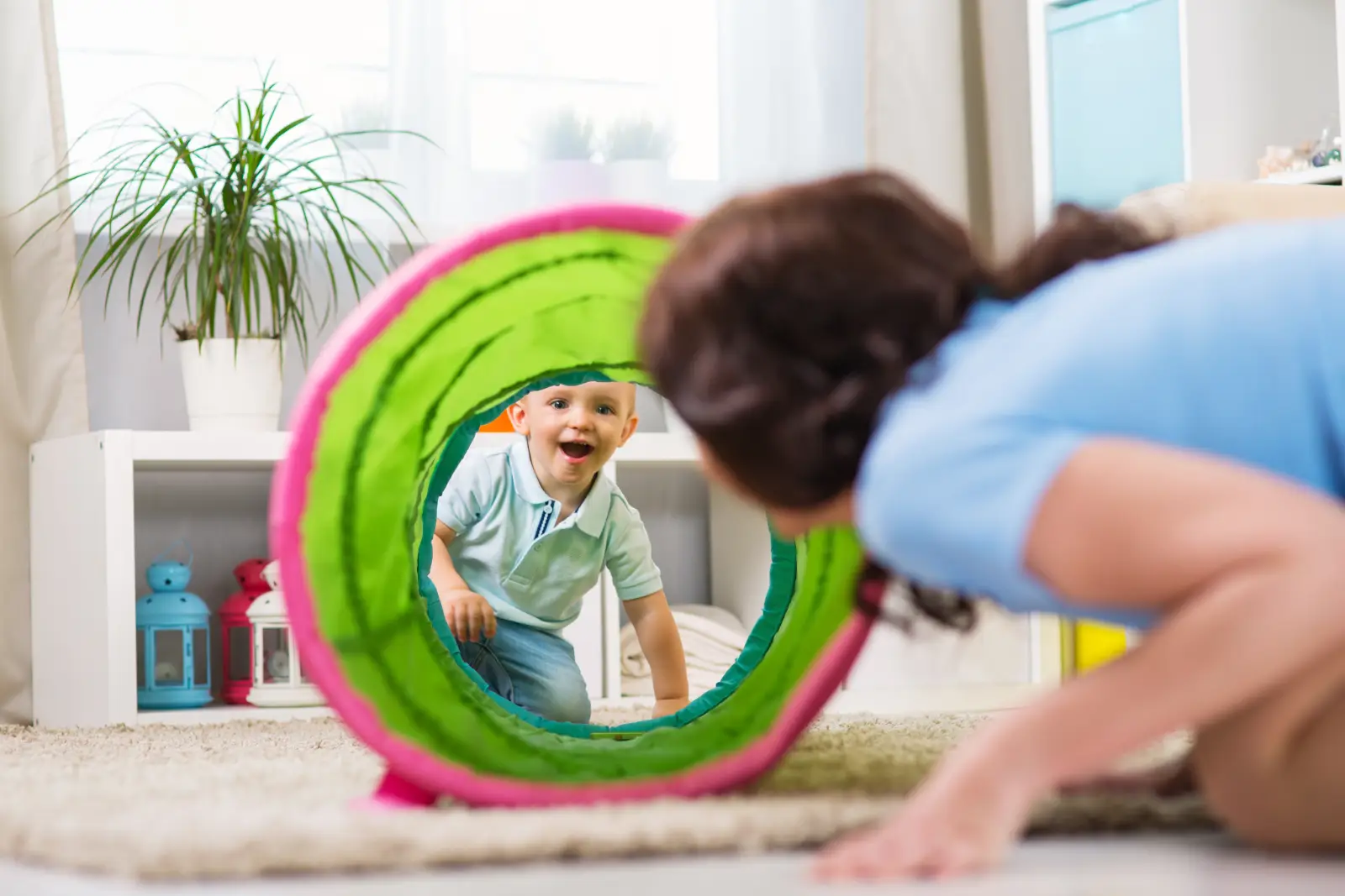 Child playing with a caregiver during an everyday activity